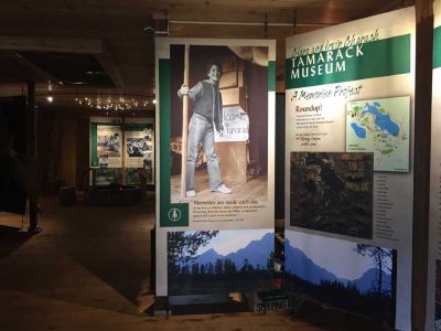 In the Tamarack Museum, rustic textures and images suggest the outdoors camping experience.